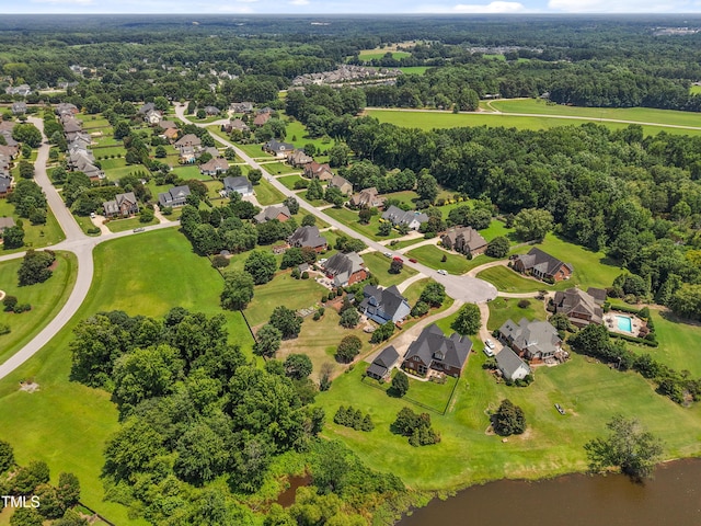 2512 Stewart St, Fuquay Varina, NC 27526 - aerial perspective of suburban area featuring a large body of water