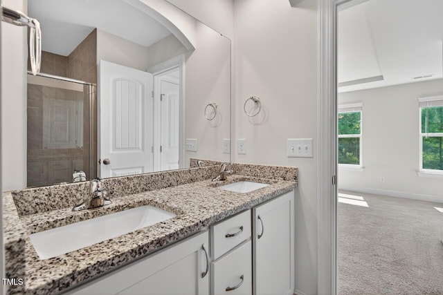 305 Lionel St, Durham, NC 27705 - full bath with double vanity and a stall shower