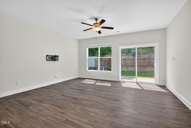 305 Lionel St, Durham, NC 27705 - empty room featuring ceiling fan and dark wood-style flooring