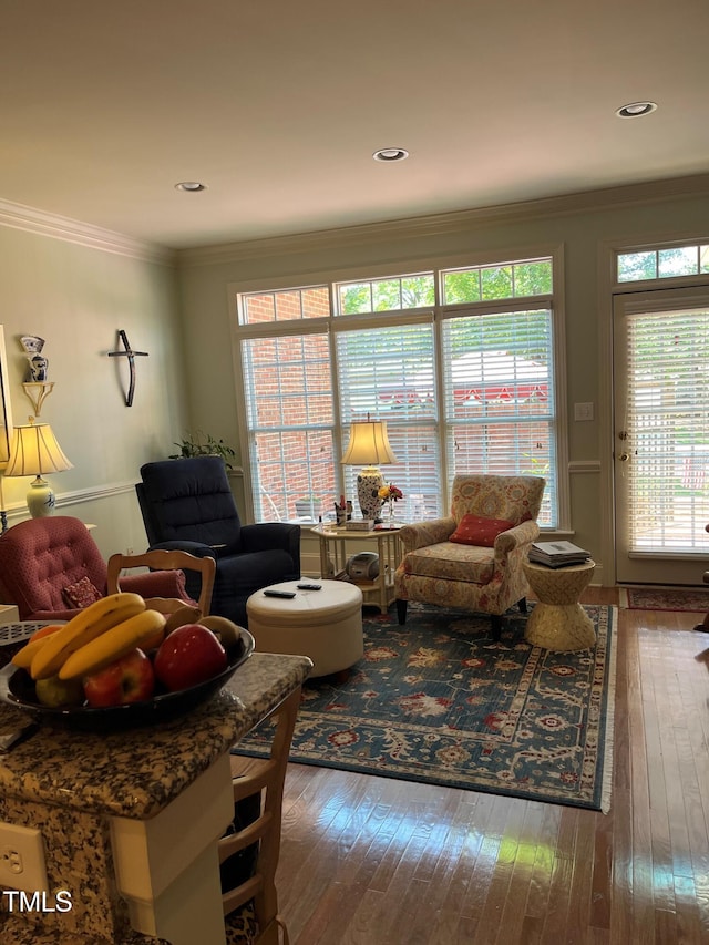 3802 Burwell Rollins Cir, Raleigh, NC 27612 - living area featuring hardwood / wood-style floors and ornamental molding