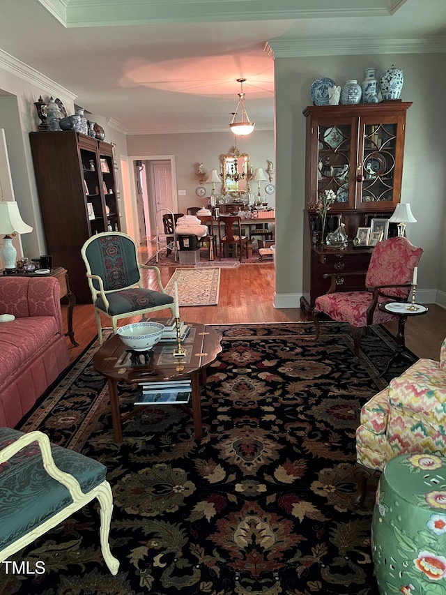 3802 Burwell Rollins Cir, Raleigh, NC 27612 - living room featuring ornamental molding and wood finished floors