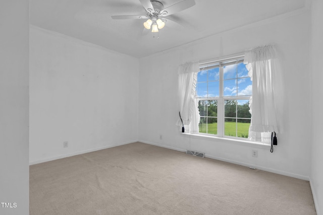 9633 Grassy Creek Rd, Bullock, NC 27507 - unfurnished room with carpet floors, ornamental molding, and ceiling fan