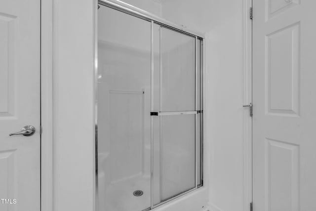 9633 Grassy Creek Rd, Bullock, NC 27507 - full bathroom featuring a shower with door