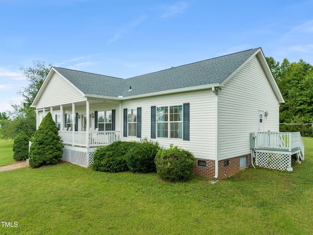 9633 Grassy Creek Rd, Bullock, NC 27507 - view of side of home featuring covered porch, a lawn, crawl space, and a shingled roof