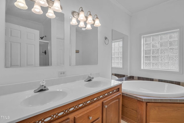 9633 Grassy Creek Rd, Bullock, NC 27507 - bathroom featuring a chandelier, double vanity, a bath, a shower stall, and crown molding