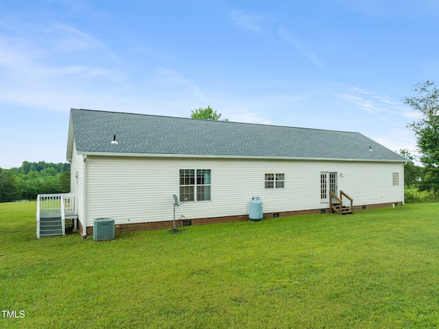 9633 Grassy Creek Rd, Bullock, NC 27507 - back of property with entry steps, a lawn, roof with shingles, crawl space, and french doors