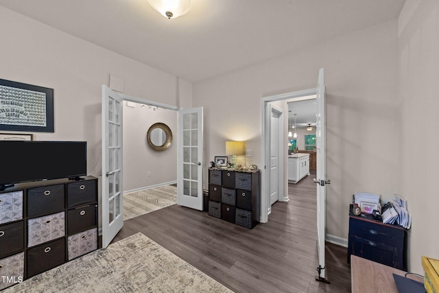 2370 Friars Head Ct, Fuquay Varina, NC 27526 - sitting room with french doors and wood finished floors