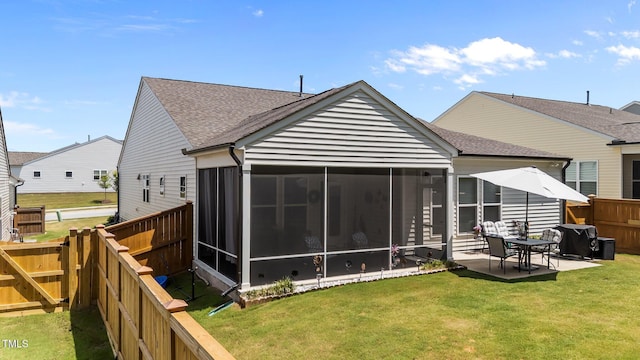 2370 Friars Head Ct, Fuquay Varina, NC 27526 - rear view of property featuring a sunroom, roof with shingles, a fenced backyard, and a patio
