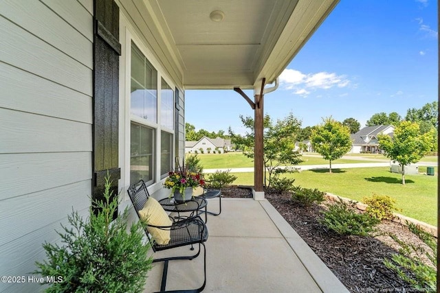 829 Warwick Ln, Carthage, NC 28327 - covered porch with a yard
