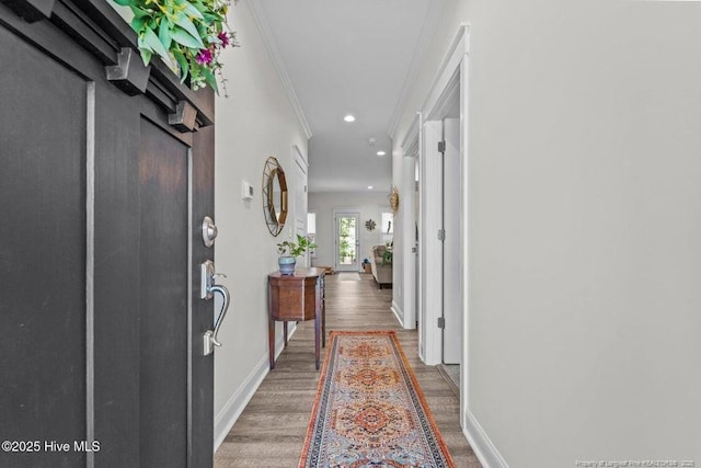 829 Warwick Ln, Carthage, NC 28327 - corridor with wood finished floors, ornamental molding, and recessed lighting