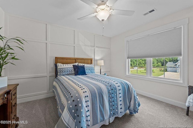 829 Warwick Ln, Carthage, NC 28327 - carpeted bedroom featuring a decorative wall and a ceiling fan