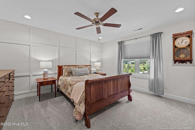 829 Warwick Ln, Carthage, NC 28327 - bedroom featuring a decorative wall, recessed lighting, light carpet, and ceiling fan