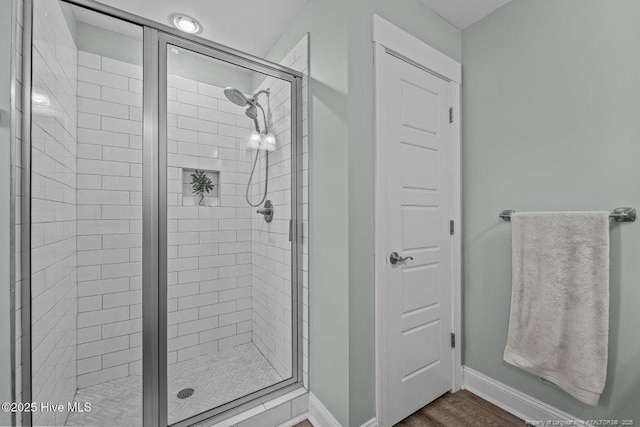 829 Warwick Ln, Carthage, NC 28327 - full bath featuring a shower stall and wood finished floors