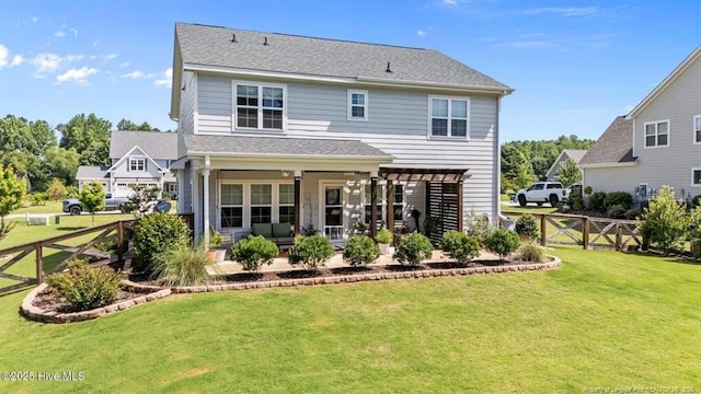 829 Warwick Ln, Carthage, NC 28327 - back of property featuring a fenced backyard, a patio, and a gate