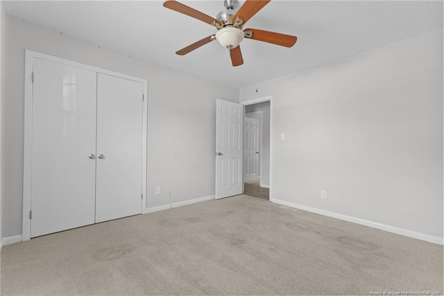 801 Algood Ave, Hope Mills, NC 28348 - unfurnished bedroom with carpet, ceiling fan, and a closet