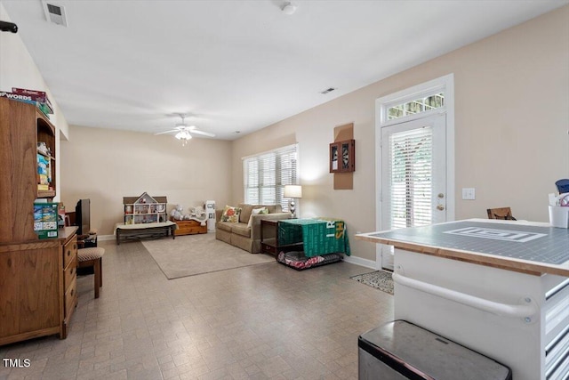 4742 Ludwell Branch Ct, Raleigh, NC 27612 - living room with baseboards and ceiling fan