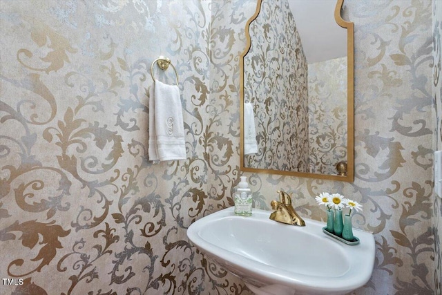 4742 Ludwell Branch Ct, Raleigh, NC 27612 - bathroom featuring a sink and wallpapered walls