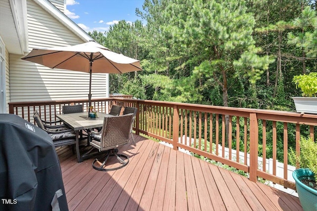 4742 Ludwell Branch Ct, Raleigh, NC 27612 - wooden deck with outdoor dining area and grilling area