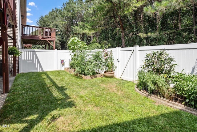 4742 Ludwell Branch Ct, Raleigh, NC 27612 - fenced backyard featuring a garden