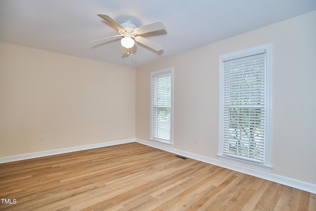 119 Heatherwood Dr, Apex, NC 27502 - unfurnished room featuring light wood-style floors and a ceiling fan