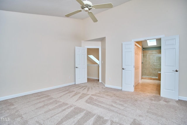 119 Heatherwood Dr, Apex, NC 27502 - unfurnished bedroom with carpet flooring, a towering ceiling, connected bathroom, and ceiling fan