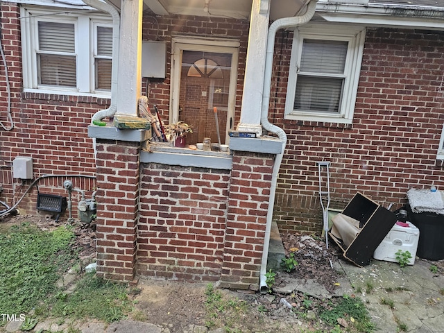 2928 N Patterson Ave, Winston-Salem, NC 27105 - property entrance with brick siding and crawl space