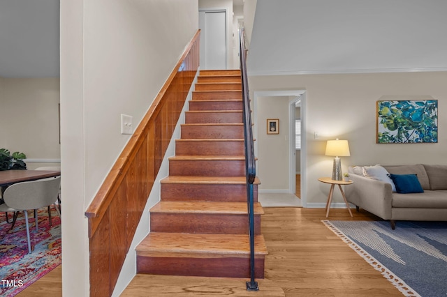 101 Hunter Pl, Carrboro, NC 27510 - staircase with wood finished floors and crown molding