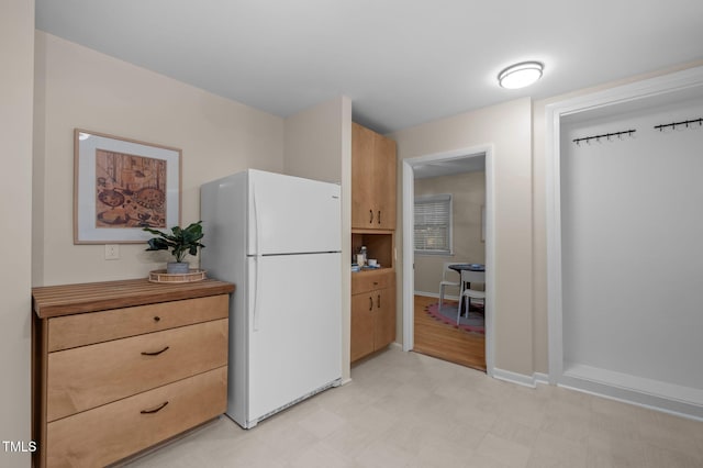101 Hunter Pl, Carrboro, NC 27510 - kitchen featuring freestanding refrigerator and light floors