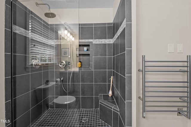 101 Hunter Pl, Carrboro, NC 27510 - full bathroom featuring radiator, a towel warmer, and tiled shower