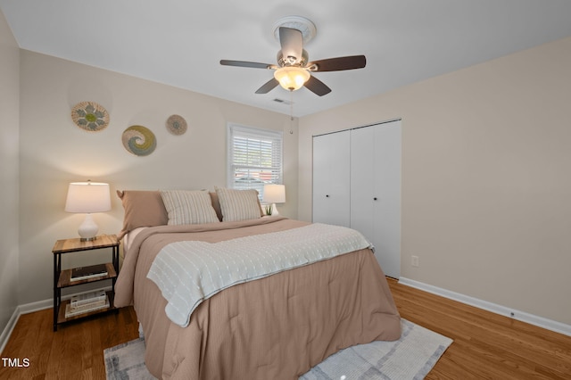 101 Hunter Pl, Carrboro, NC 27510 - bedroom with wood finished floors, a closet, and a ceiling fan