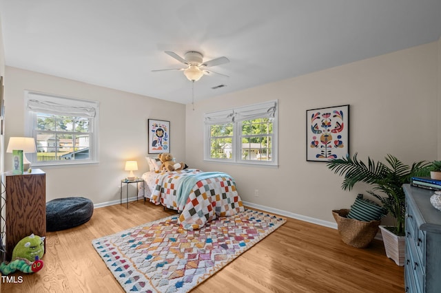 101 Hunter Pl, Carrboro, NC 27510 - bedroom with wood finished floors and ceiling fan