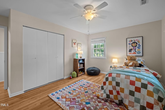 101 Hunter Pl, Carrboro, NC 27510 - bedroom with wood finished floors, a closet, and a ceiling fan