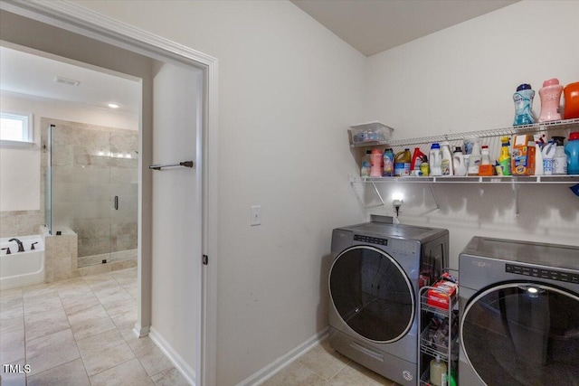 470 Duggins Pt, Apex, NC 27523 - laundry room featuring washing machine and clothes dryer and baseboards