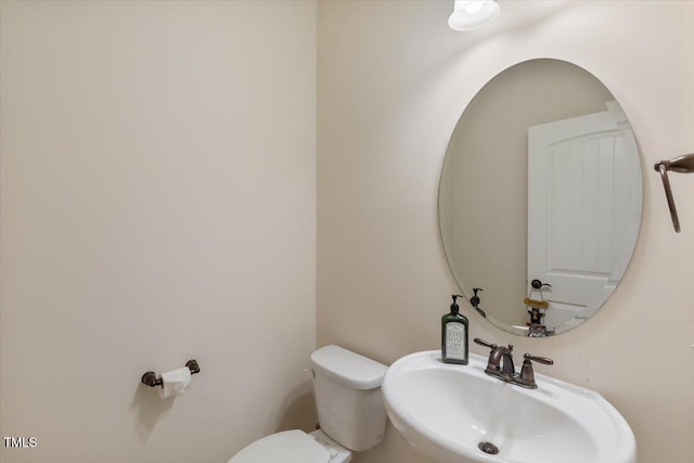470 Duggins Pt, Apex, NC 27523 - half bath featuring a sink and toilet