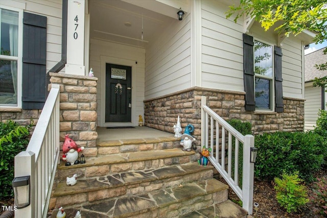 470 Duggins Pt, Apex, NC 27523 - view of exterior entry featuring a porch and stone siding