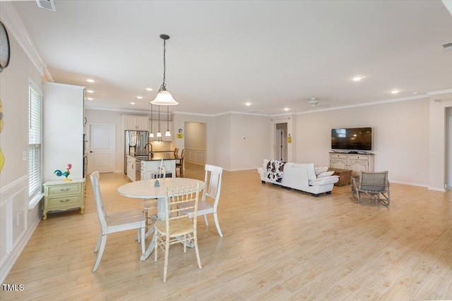 470 Duggins Pt, Apex, NC 27523 - dining room featuring ornamental molding, recessed lighting, light wood-type flooring, and ceiling fan