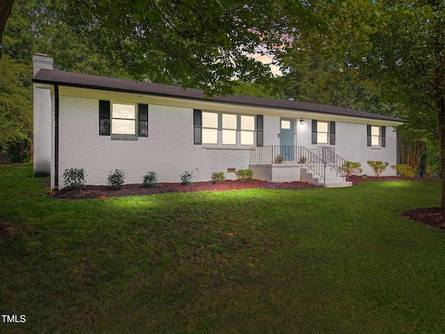 4011 Garrett Rd, Durham, NC 27707 - ranch-style home with brick siding, a chimney, a front lawn, and crawl space