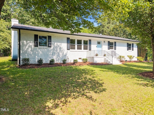 4011 Garrett Rd, Durham, NC 27707 - ranch-style house with a chimney, a front lawn, crawl space, and brick siding