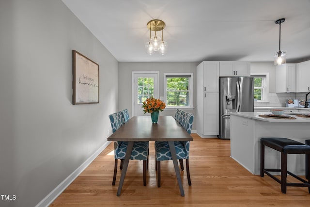 4011 Garrett Rd, Durham, NC 27707 - dining space featuring light wood-style floors and plenty of natural light