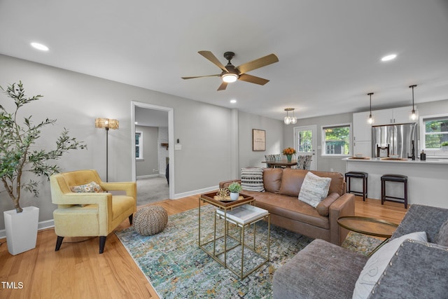 4011 Garrett Rd, Durham, NC 27707 - living area featuring ceiling fan, light wood finished floors, and recessed lighting