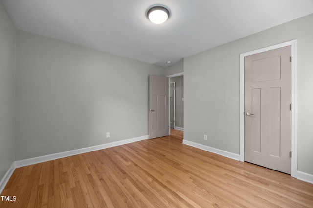 4011 Garrett Rd, Durham, NC 27707 - unfurnished bedroom with light wood-style flooring