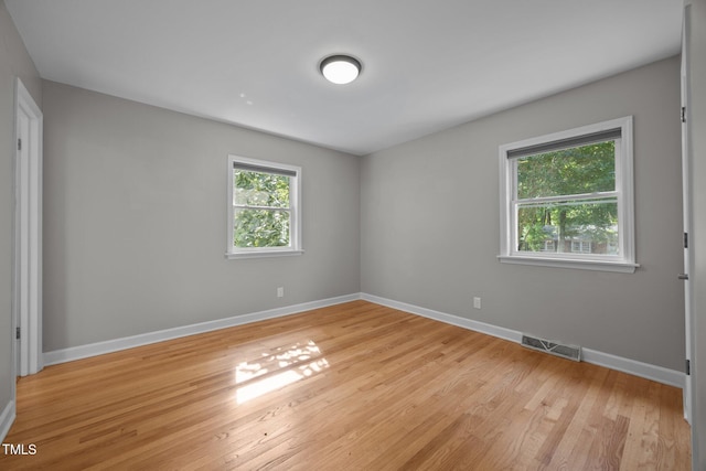 4011 Garrett Rd, Durham, NC 27707 - spare room featuring light wood-type flooring and baseboards