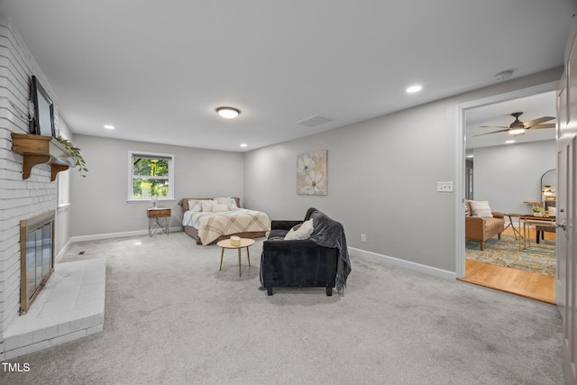 4011 Garrett Rd, Durham, NC 27707 - bedroom with a fireplace, carpet floors, and recessed lighting