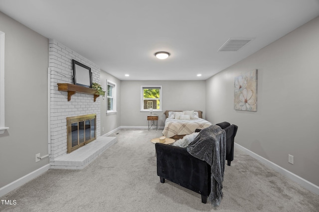 4011 Garrett Rd, Durham, NC 27707 - carpeted bedroom featuring a fireplace and recessed lighting