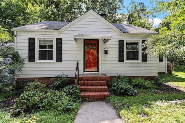 1300 Ruffin St, Durham, NC 27701 - bungalow-style home with a shingled roof and a chimney