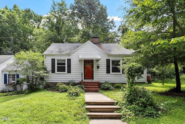 1300 Ruffin St, Durham, NC 27701 - bungalow with a chimney, a front lawn, and a shingled roof