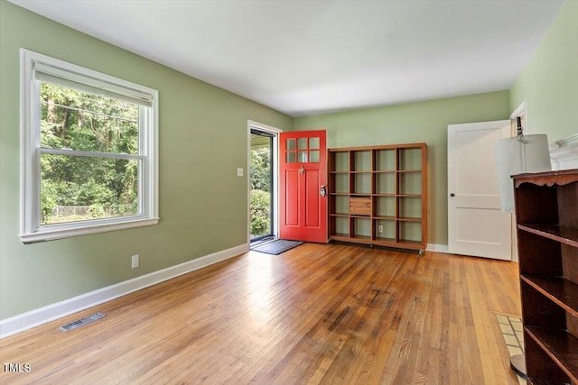 1300 Ruffin St, Durham, NC 27701 - entrance foyer with wood finished floors and baseboards