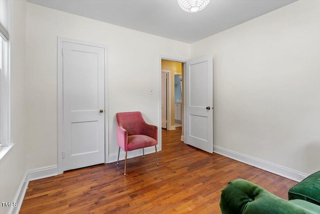 1300 Ruffin St, Durham, NC 27701 - sitting room featuring wood finished floors and baseboards