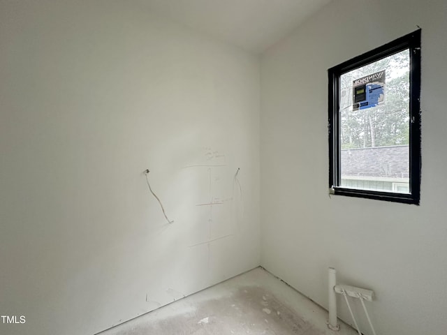 7809 Haymarket Ln, Raleigh, NC 27615 - spare room featuring healthy amount of natural light and concrete floors