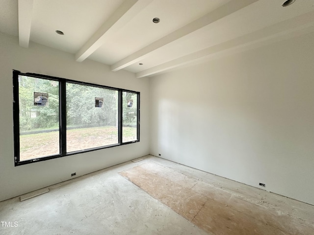 7809 Haymarket Ln, Raleigh, NC 27615 - unfurnished room featuring beam ceiling